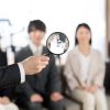 Image of searching for human resources with a magnifying glass